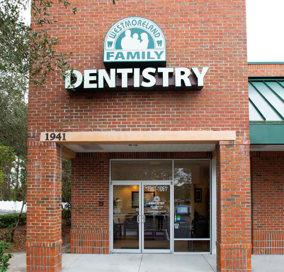 Exterior view of the Westmoreland Family Dentistry red, brick building